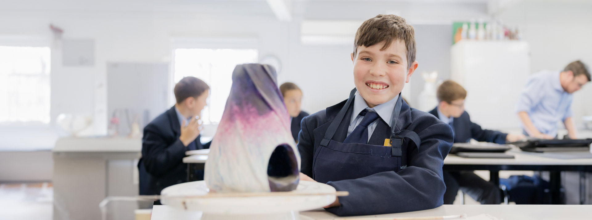 St Columba's High School Springwood student making pottery