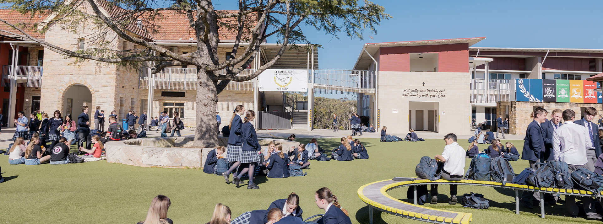 Students having lunch on the school grounds at St Columba’s Catholic College Springwood