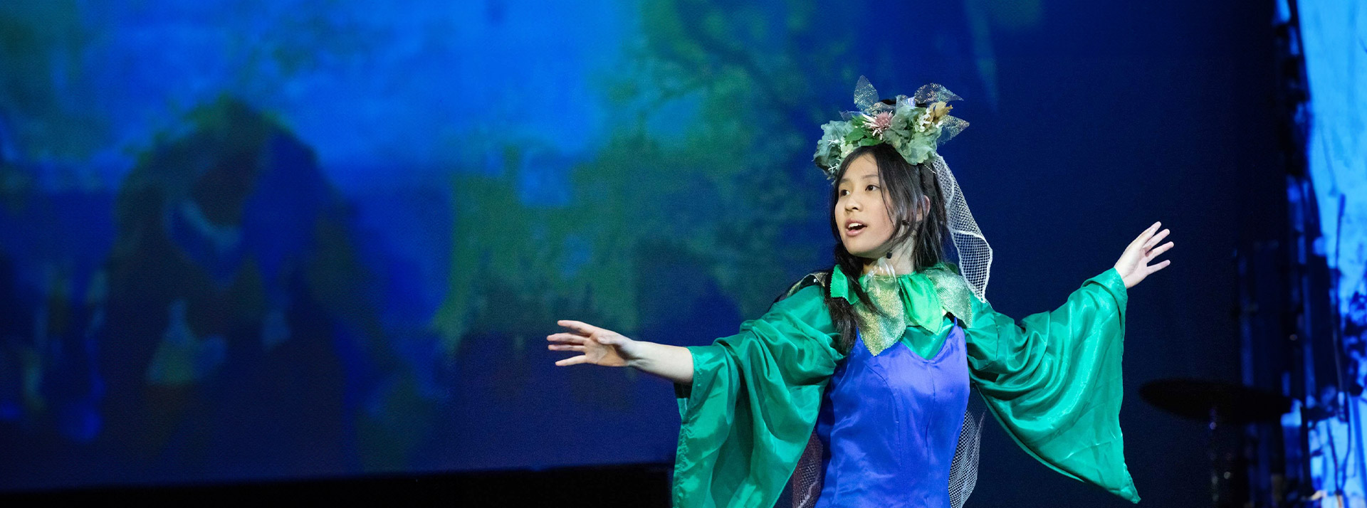 Student performing in a school performance at St Columba’s Catholic College Springwood