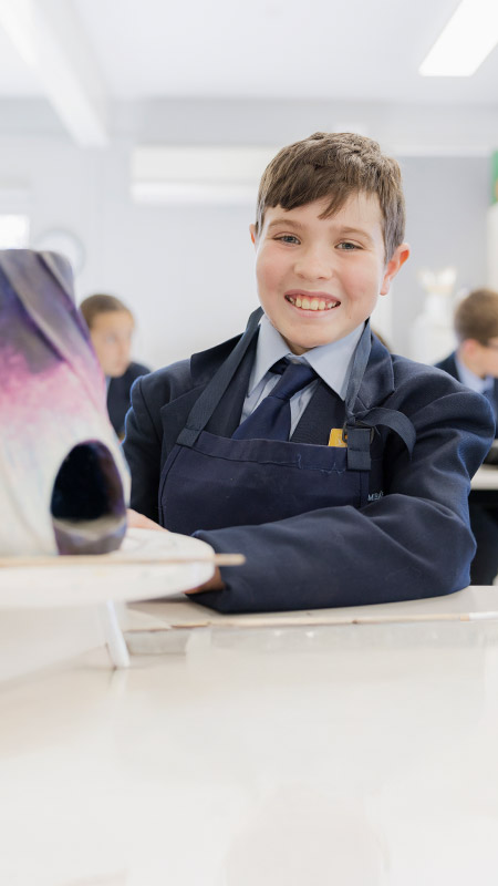 St Columba's High School Springwood student making pottery