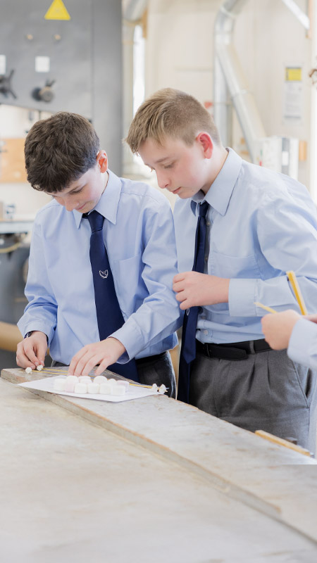 Students working together in the classroom at St Columba’s Catholic College Springwood