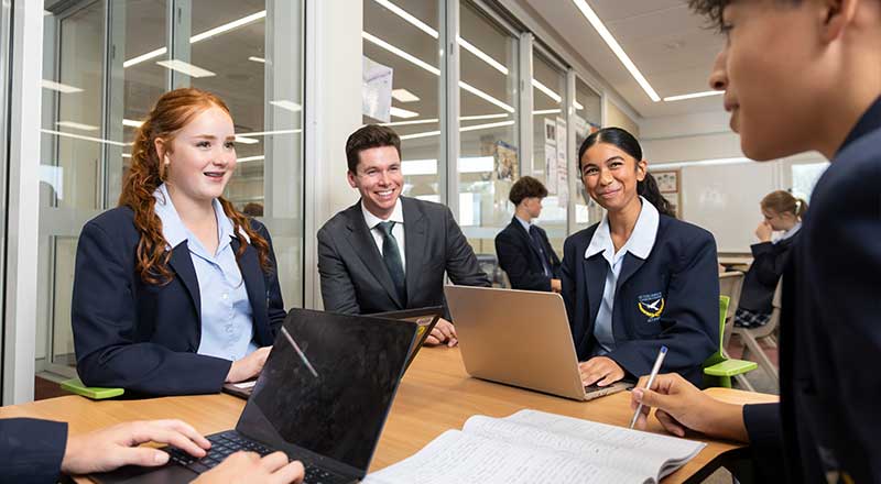 St Columba's Catholic College senior students in class using laptops